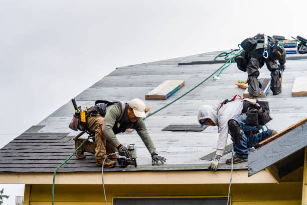 Professional Gutter Installation technician working in Livingston, CA